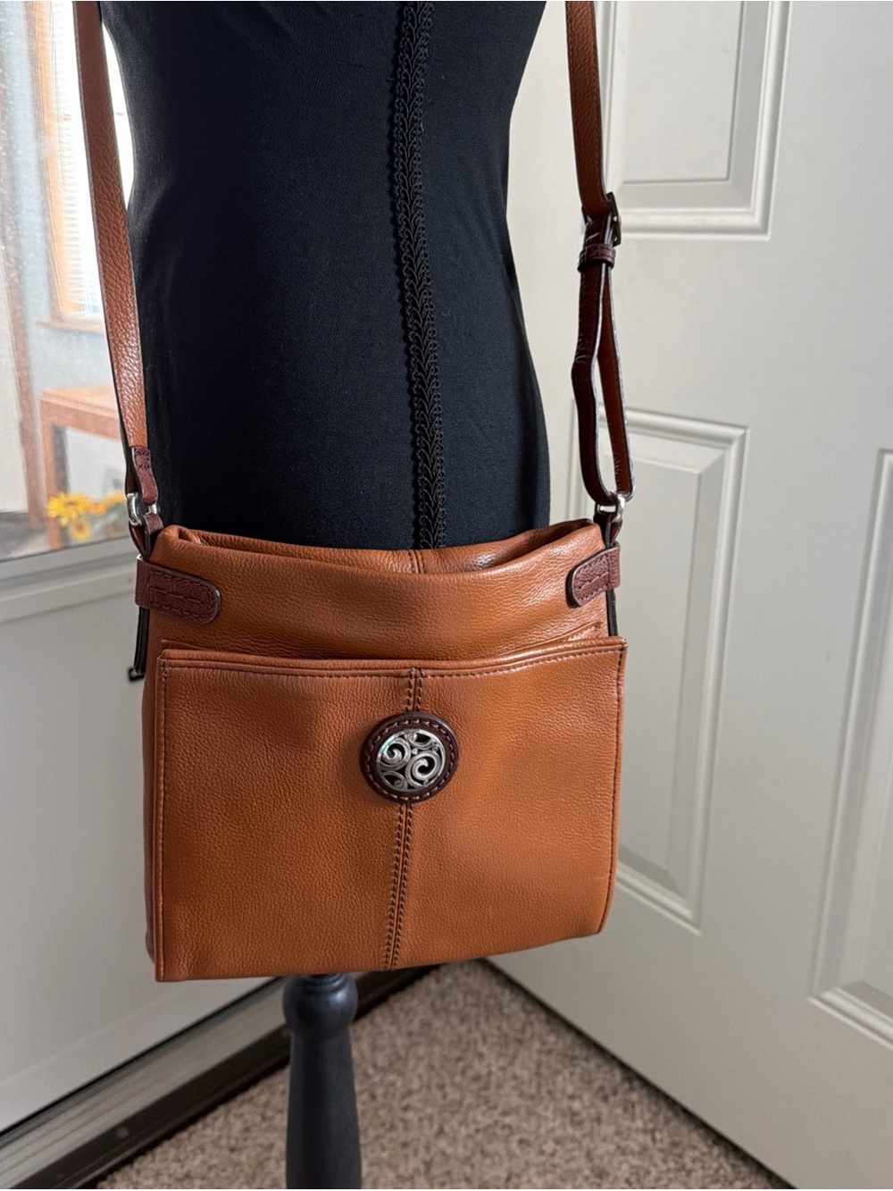 Brighton Cognac Brown Pebbled Leather Crossbody with Decorative Medallion